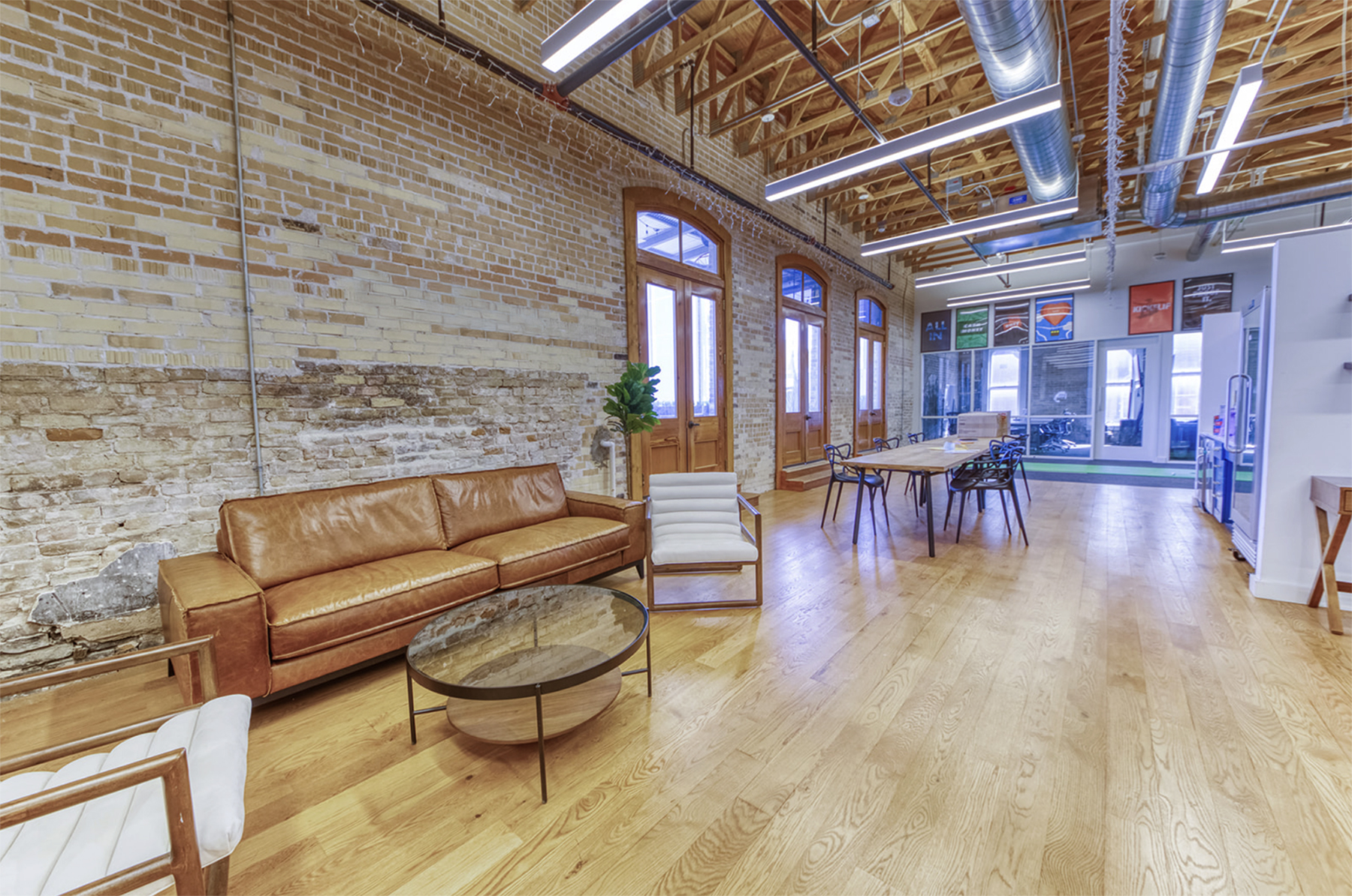 Hands-on working room at Q Branch with open desks and lounge